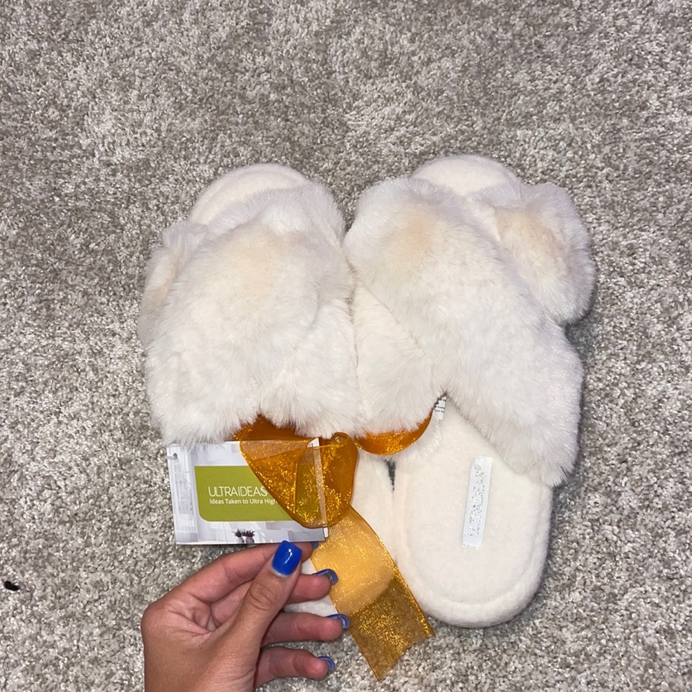 White fuzzy slippers